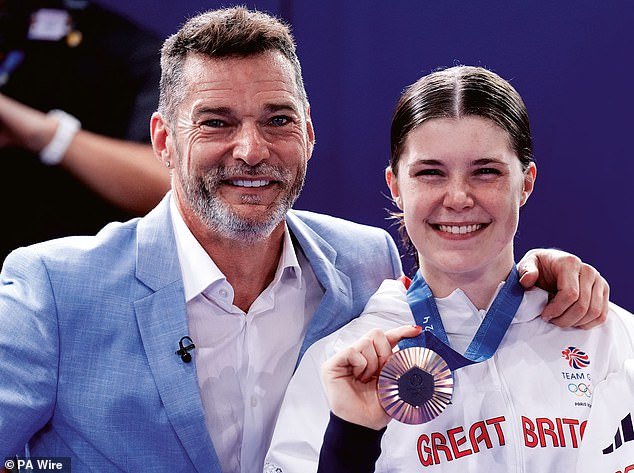 Fred with daughter Andrea after her medal win at the Paris Olympics